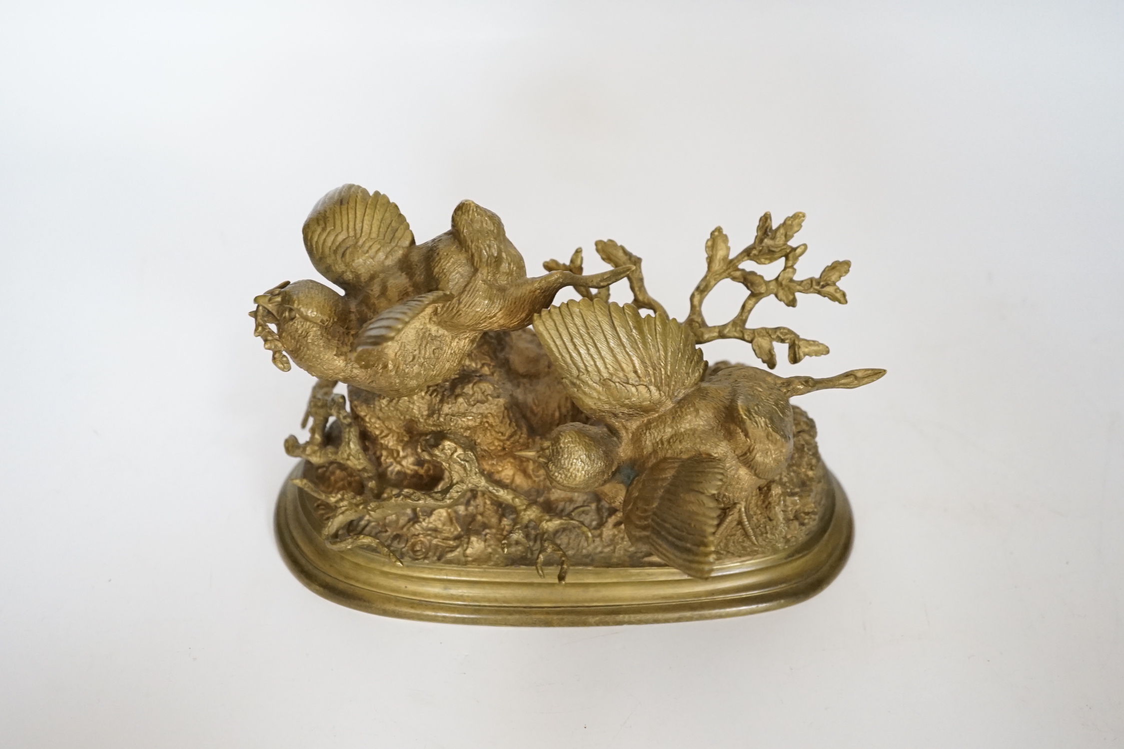 Ferdinand Pautrot (1832 - 1874), a French gilt bronze group of two birds, signed and inscribed Beaux Arts, 19cm wide